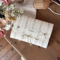 matelas à langer nomade rayures fleuri rose