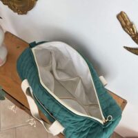 sac à langer matelassé velours vert intérieur