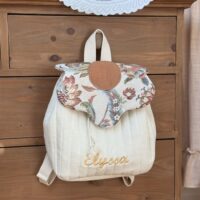 sac à dos à dos matelassé écru rabat fleur jacquard