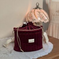 sac seau matelassé velours bordeaux
