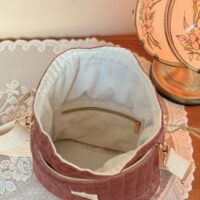 sac seau matelassé velours rose intérieur