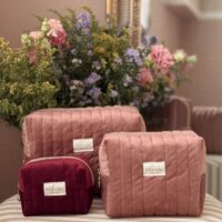 trousses de toilette matelassées rose et bordeaux