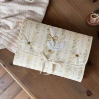 matelas à langer nomade rayures fleuri jaune broderie oie